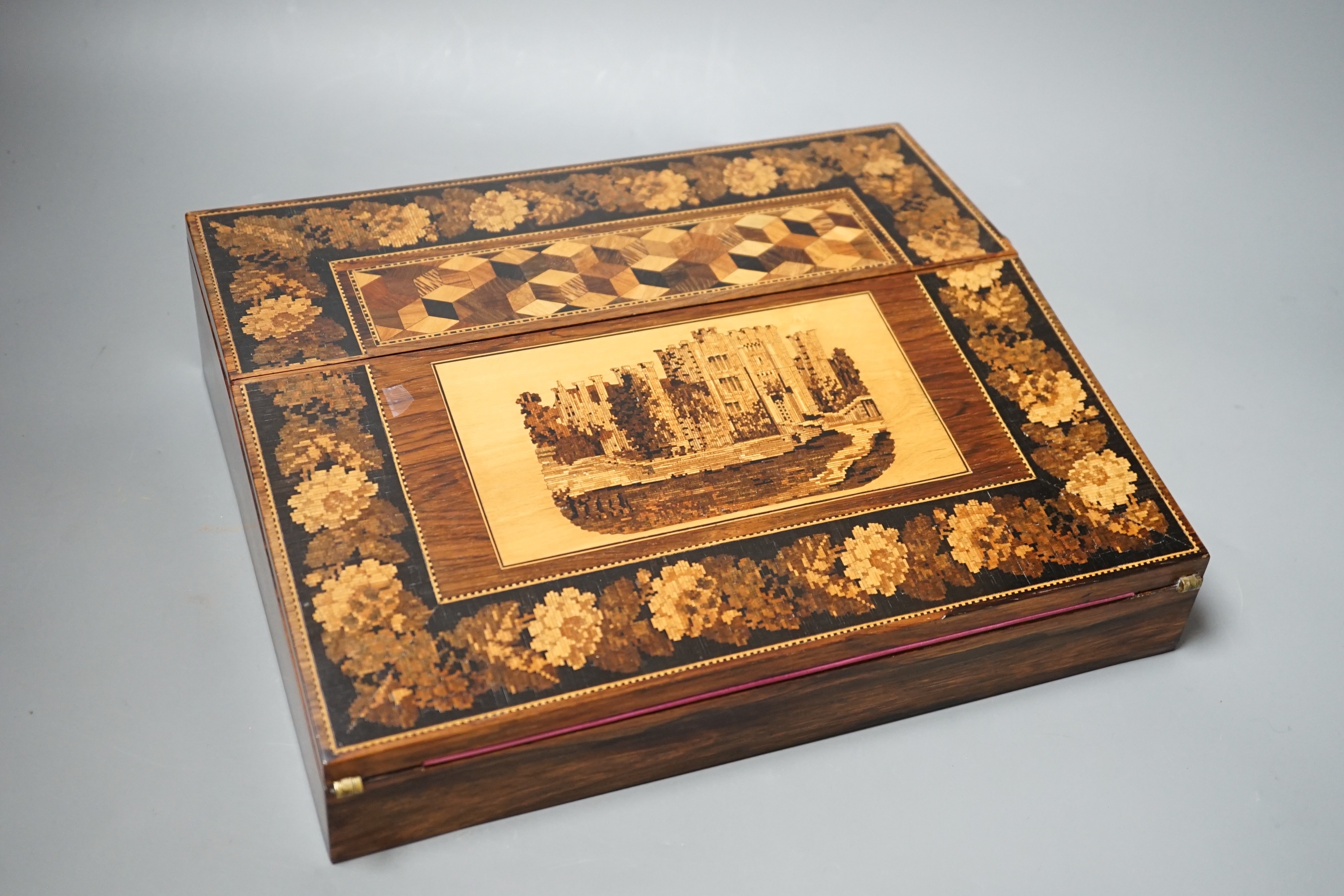 A Tunbridge ware rosewood, perspective cube marquetry and mosaic writing slope, view of Hever castle, 30.5cm wide